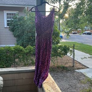 Full-length light summer dress.